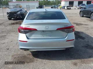 2023 Honda Civic Touring with VIN 2HGFE1F91PH305053, listed as a IAAI auction lot 42378311 with 41,576 mi miles and . Bid and sale history available at DreamBid. Image 17.