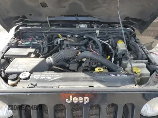 2007 Jeep Wrangler Unlimited Sahara with VIN 1J4GA59197L121262, listed as a Copart auction lot 61551685 with 233,309 mi miles and Clean title. Bid and sale history available at DreamBid. Image 12.