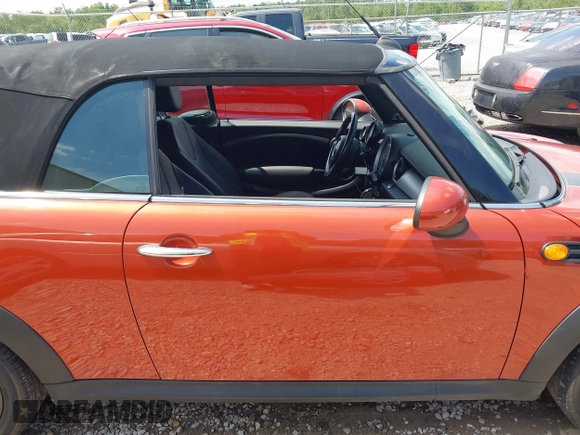 2011 MINI Convertible with VIN WMWZN3C57BTZ89303, listed as a IAAI auction lot 42352242 with 146,448 mi miles and . Bid and sale history available at DreamBid. Image 13.