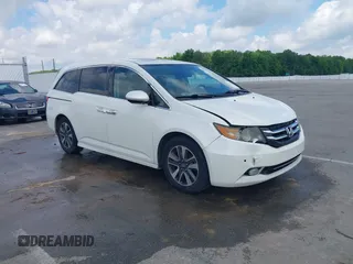 2016 Honda Odyssey Touring Elite with VIN 5FNRL5H90GB067238, listed as a IAAI auction lot 42247894 with 196,972 mi miles and . Bid and sale history available at DreamBid. Image 1.
