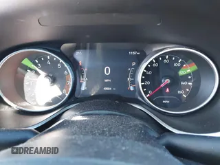 2021 Jeep Compass Altitude z VIN 3C4NJDBB0MT552101, wystawiony jako IAAI lot #41578726 z przebiegiem 49 684 mil mil oraz . Historia ofert i sprzedaży dostępna na DreamBid. Obrazek 7.