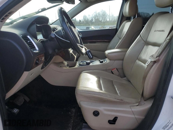 2014 Dodge Durango Citadel with VIN 1C4SDJET9EC303953, listed as a Copart auction lot 42449905 with 149,089 mi miles and Salvage Title. Bid and sale history available at DreamBid. Image 7.