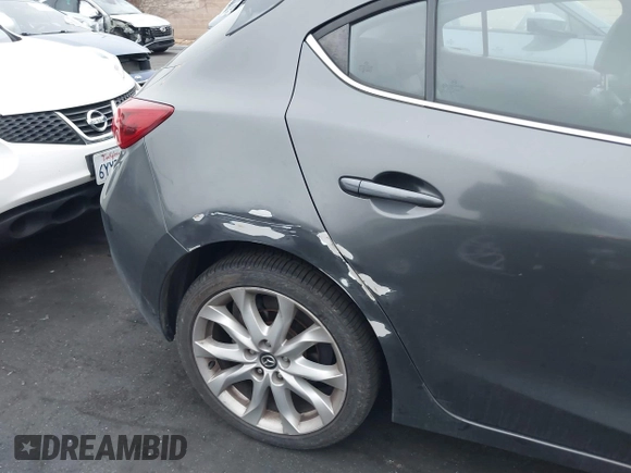 2014 Mazda 3 S Touring with VIN JM1BM1L35E1208952, listed as a IAAI auction lot 42121077 with 183,985 mi miles and . Bid and sale history available at carsss.com. Image 18.