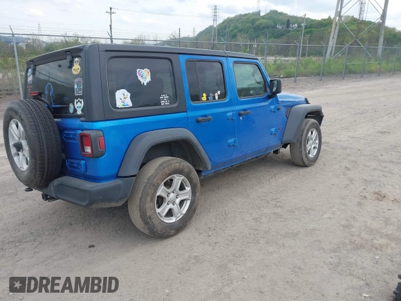 2023 Jeep Wrangler Sport with VIN 1C4HJXDG5PW530309, listed as a IAAI auction lot 42154961 with 29,846 mi miles and . Bid and sale history available at DreamBid. Image 4.