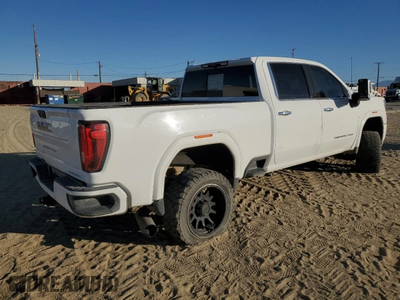 2021 GMC Sierra 3500HD Denali z VIN 1GT49WEYXMF156221, wystawiony jako Copart lot #81958804 z przebiegiem 60 986 mil mil oraz Nie do naprawy • Non repairable. Historia ofert i sprzedaży dostępna na DreamBid. Obrazek 3.