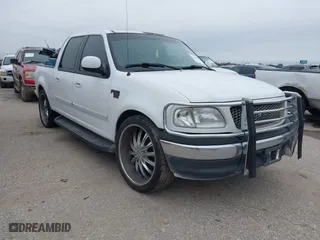 2001 Ford F-150 SuperCrew XLT with VIN 1FTRW07L51KC27454, listed as a IAAI auction lot 41554376 with 1 mi miles. Bid and sale history available at carsss.com. Image 1.