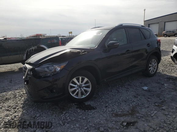 2016 Mazda CX-5 Touring z VIN JM3KE4CY0G0667171, wystawiony jako Copart lot #51579005 z przebiegiem 39 487 mil mil oraz Szkoda całkowita • Salvage title. Historia ofert i sprzedaży dostępna na DreamBid. Obrazek 1.