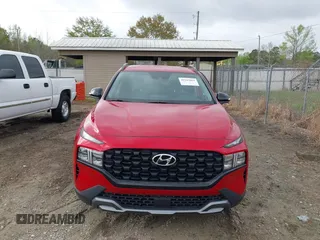 2022 Hyundai Santa Fe SEL with VIN 5NMS64AJ6NH393466, listed as a IAAI auction lot 41943864 with 12,676 mi miles and . Bid and sale history available at DreamBid. Image 12.
