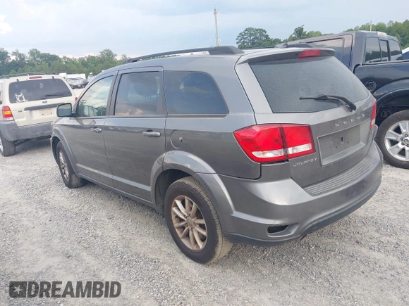 2013 Dodge Journey SXT with VIN 3C4PDCBG7DT568284, listed as a IAAI auction lot 42508928 with 215,803 mi miles and . Bid and sale history available at DreamBid. Image 3.