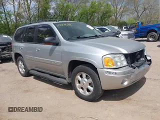 2005 GMC Envoy SLE z VIN 1GKDT13S852271545, wystawiony jako IAAI lot #42117632 z przebiegiem 213 355 mil mil oraz . Historia ofert i sprzedaży dostępna na DreamBid. Obrazek 1.