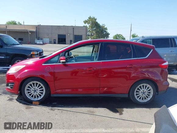 2013 Ford C-Max SEL z VIN 1FADP5CU4DL555035, wystawiony jako IAAI lot #42355498 z przebiegiem 172 374 mil mil oraz . Historia ofert i sprzedaży dostępna na DreamBid. Obrazek 14.