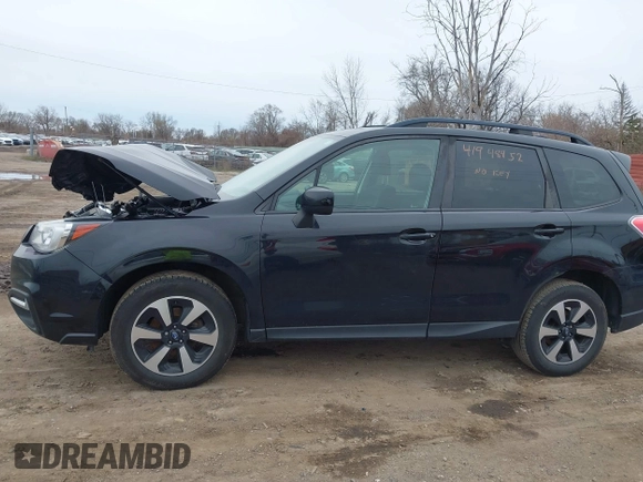 2018 Subaru Forester Premium with VIN JF2SJAGC5JH608614, listed as a IAAI auction lot 41948462 with 115,671 mi miles and . Bid and sale history available at DreamBid. Image 14.