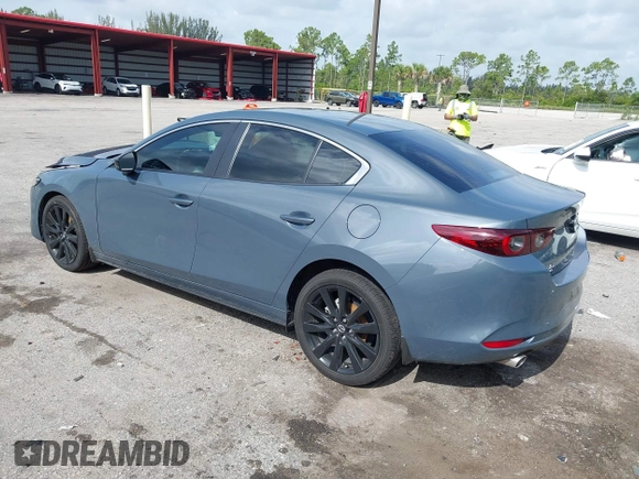 2024 Mazda 3 S Carbon Edition with VIN 3MZBPBCM2RM403824, listed as a IAAI auction lot 42612315 with 8,261 mi miles and . Bid and sale history available at DreamBid. Image 3.