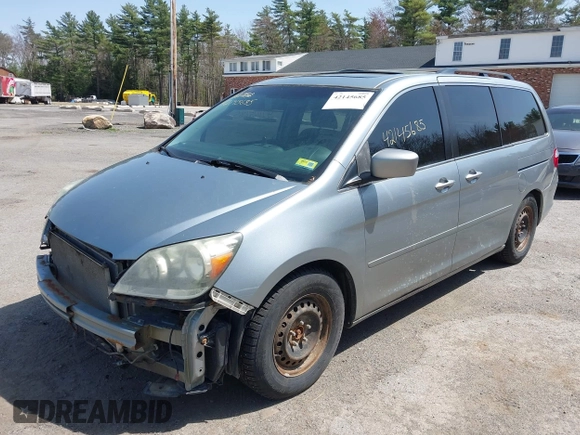 2007 Honda Odyssey Touring with VIN 5FNRL38867B122822, listed as a IAAI auction lot 42145685 with 212,164 mi miles. Bid and sale history available at carsss.com. Image 2.