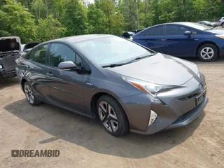 2017 Toyota Prius Two z VIN JTDKARFU9H3538176, wystawiony jako IAAI lot #42398875 z przebiegiem 125 757 mil mil oraz . Historia ofert i sprzedaży dostępna na DreamBid. Obrazek 1.