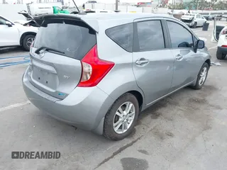 2014 Nissan Note SV z VIN 3N1CE2CP3EL394433, wystawiony jako IAAI lot #42421291 z przebiegiem 100 966 mil mil oraz . Historia ofert i sprzedaży dostępna na DreamBid. Obrazek 4.