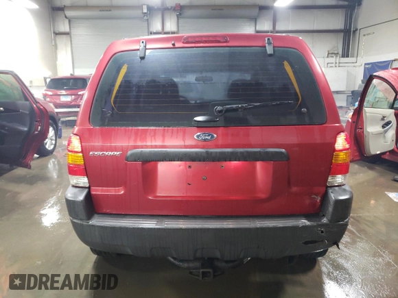 2004 Ford Escape XLS with VIN 1FMYU021X4DA05312, listed as a Copart auction lot 86185954 with 186,010 mi miles and Salvage Title. Bid and sale history available at DreamBid. Image 6.