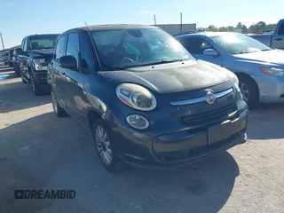 2014 FIAT 500L Easy with VIN ZFBCFABH6EZ028069, listed as a IAAI auction lot 41303148 with 131,757 mi miles and . Bid and sale history available at DreamBid. Image 1.