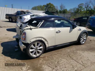 2014 MINI Coupe S z VIN WMWSX3C54ET772839, wystawiony jako Copart lot #73992794 z przebiegiem 100 580 mil mil oraz Nie do naprawy. Historia ofert i sprzedaży dostępna na DreamBid. Obrazek 3.