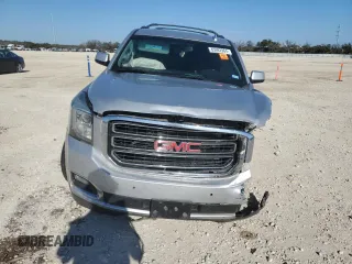2015 GMC Yukon SLE with VIN 1GKS1AKC1FR716322, listed as a Copart auction lot 85992964 with 141,552 mi miles and Salvage Title. Bid and sale history available at carsss.com. Image 5.
