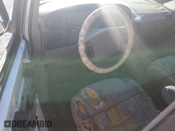 1993 Ford Aerostar z VIN 1FMDA31X9PZA67712, wystawiony jako Copart lot #80171704 z przebiegiem 229 582 mil mil oraz Szkoda całkowita • Salvage title. Historia ofert i sprzedaży dostępna na DreamBid. Obrazek 8.