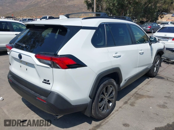 2024 Toyota RAV4 Hybrid XLE Premium with VIN JTMB6RFV9RJ063328, listed as a IAAI auction lot 42433233 with 9,874 mi miles and . Bid and sale history available at DreamBid. Image 4.