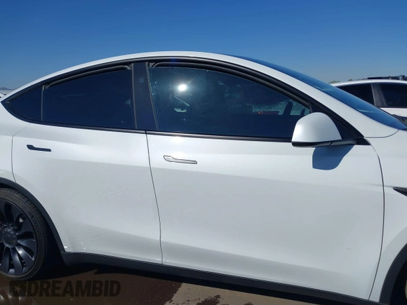 2024 Tesla Model Y Performance with VIN 7SAYGDEF4RF053711, listed as a IAAI auction lot 41836931 with 12,442 mi miles and . Bid and sale history available at DreamBid. Image 13.