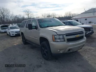 2007 Chevrolet Suburban LT with VIN 1GNFK16397J307142, listed as a IAAI auction lot 41270352 with 184,555 mi miles. Bid and sale history available at carsss.com. Image 1.