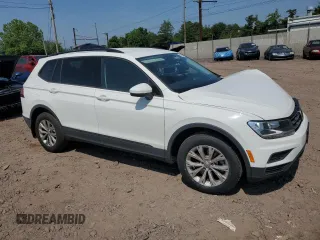 2020 Volkswagen Tiguan S с VIN 3VV0B7AXXLM030852, выставлен на аукционе Copart как лот 60692205 с пробегом 78 990 миль миль и Списание • Salvage title. История ставок и продаж доступна на DreamBid. Изображение 4.