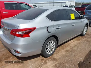 2019 Nissan Sentra SV z VIN 3N1AB7AP2KY296928, wystawiony jako IAAI lot #41923708 z przebiegiem 70 853 mil mil oraz . Historia ofert i sprzedaży dostępna na DreamBid. Obrazek 4.