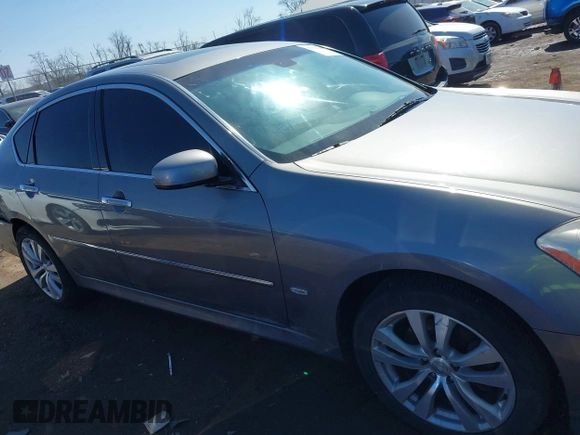 2010 Infiniti M with VIN JN1CY0AR7AM960352, listed as a IAAI auction lot 41754408 with 227,408 mi miles. Bid and sale history available at carsss.com. Image 13.