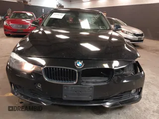 2014 BMW 3 Series 328i xDrive with VIN WBA3B3G50ENR83599, listed as a IAAI auction lot 42106340 with 195,309 mi miles. Bid and sale history available at carsss.com. Image 6.