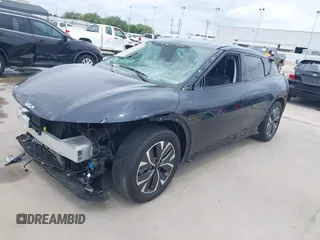 2024 Kia EV6 Light z VIN KNDC34LB7R5616772, wystawiony jako IAAI lot #42133260 z przebiegiem 10 415 mil mil oraz . Historia ofert i sprzedaży dostępna na DreamBid. Obrazek 2.