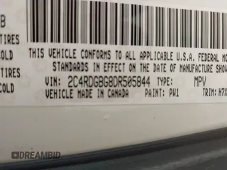 2013 Dodge Grand Caravan SE with VIN 2C4RDGBG8DR505844, listed as a IAAI auction lot 42139152 with 206,399 mi miles and . Bid and sale history available at DreamBid. Image 9.