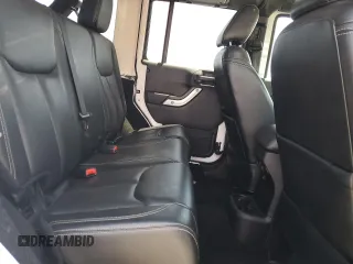 2015 Jeep Wrangler Unlimited Rubicon с VIN 1C4BJWFG3FL771508, выставлен на аукционе Copart как лот 62006295 с пробегом 108 128 миль миль и Списание • Salvage title. История ставок и продаж доступна на DreamBid. Изображение 11.
