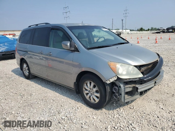 2010 Honda Odyssey EX-L z VIN 5FNRL3H74AB034608, wystawiony jako Copart lot #59262505 z przebiegiem 243 186 mil mil oraz Szkoda całkowita • Salvage title. Historia ofert i sprzedaży dostępna na DreamBid. Obrazek 4.