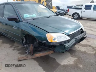 2001 Honda Civic LX with VIN JHMES16571S002955, listed as a IAAI auction lot 42128296 with 223,009 mi miles and . Bid and sale history available at DreamBid. Image 6.