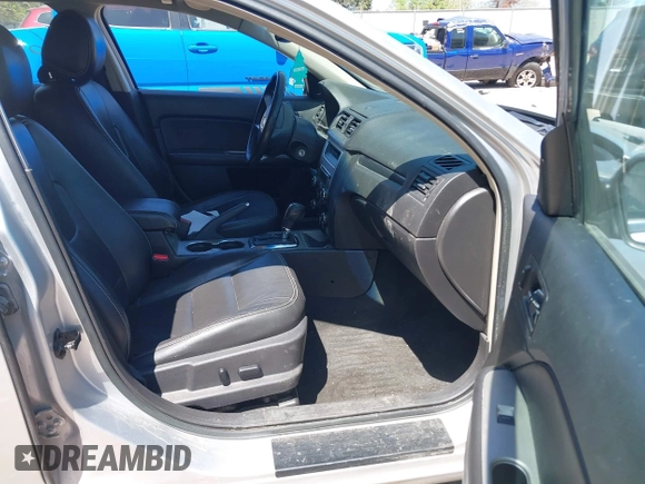 2012 Ford Fusion SEL z VIN 3FAHP0JGXCR422667, wystawiony jako IAAI lot #42226602 z przebiegiem 181 237 mil mil oraz . Historia ofert i sprzedaży dostępna na DreamBid. Obrazek 5.