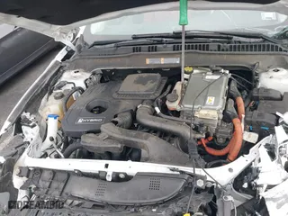 2015 Ford Fusion Titanium Hybrid with VIN 3FA6P0RU3FR247118, listed as a IAAI auction lot 41210219 with 143,348 mi miles. Bid and sale history available at carsss.com. Image 10.