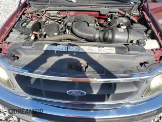 1998 Ford F-150 with VIN 1FTZX1763WNC22708, listed as a Copart auction lot 56914515 with 179,011 mi miles and Salvage title. Bid and sale history available at DreamBid. Image 11.