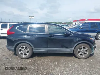2018 Honda CR-V EX with VIN 7FARW1H59JE001943, listed as a IAAI auction lot 42123180 with 72,451 mi miles and . Bid and sale history available at carsss.com. Image 14.