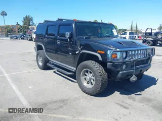 2003 Hummer H2 with VIN 5GRGN23U63H117676, listed as a IAAI auction lot 41816411 with 1 mi miles. Bid and sale history available at carsss.com. Image 1.
