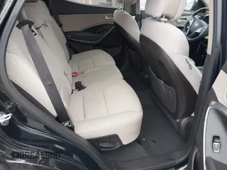 2017 Hyundai Santa Fe 2.4L z VIN 5NMZU3LB3HH011127, wystawiony jako IAAI lot #42369671 z przebiegiem 91 634 mil mil oraz . Historia ofert i sprzedaży dostępna na DreamBid. Obrazek 8.