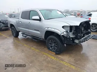 2022 Toyota Tacoma SR5 with VIN 3TMBZ5DN4NM035761, listed as a IAAI auction lot 41416928 with 52,940 mi miles and . Bid and sale history available at DreamBid. Image 1.