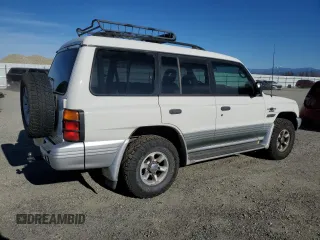 1999 Mitsubishi Montero z VIN JA4MR51R9XJ007139, wystawiony jako Copart lot #41682545 z przebiegiem 200 002 mil mil oraz Czysty tytuł • Clean title. Historia ofert i sprzedaży dostępna na DreamBid. Obrazek 3.
