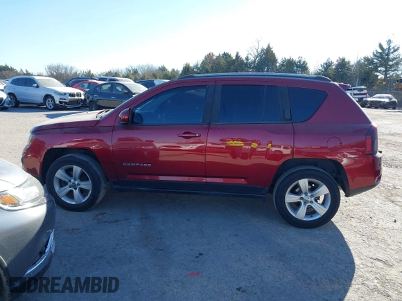 2016 Jeep Compass Latitude with VIN 1C4NJDEB1GD662807, listed as a IAAI auction lot 41161996 with 128,030 mi miles. Bid and sale history available at carsss.com. Image 13.