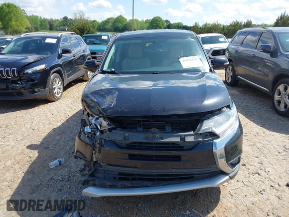 2016 Mitsubishi Outlander SE with VIN JA4AD3A34GZ004085, listed as a IAAI auction lot 41973344 with 122,849 mi miles and . Bid and sale history available at DreamBid. Image 12.