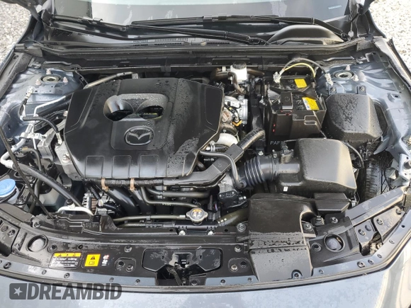 2024 Mazda 3 S Carbon Edition z VIN JM1BPBLM5R1709674, wystawiony jako Copart lot #62645125 z przebiegiem Nie podano mil oraz Nie do naprawy • Non repairable. Historia ofert i sprzedaży dostępna na DreamBid. Obrazek 11.