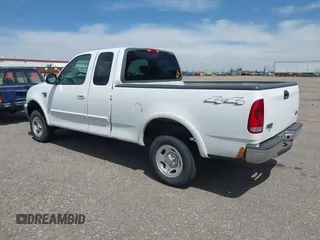 2001 Ford F-150 XL z VIN 1FTRX18W31KF80478, wystawiony jako IAAI lot #42219605 z przebiegiem 127 284 mil mil oraz . Historia ofert i sprzedaży dostępna na DreamBid. Obrazek 3.