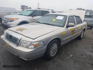 2007 Mercury Grand Marquis LS with VIN 2MEFM75V77X637957, listed as a IAAI auction lot 41520607 with 168,313 mi miles. Bid and sale history available at carsss.com. Image 2.